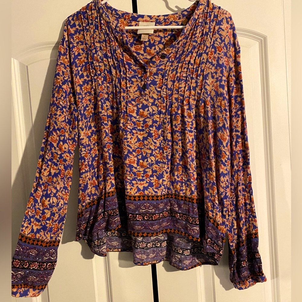 Whimsical floral long sleeve would look cute on any body type.